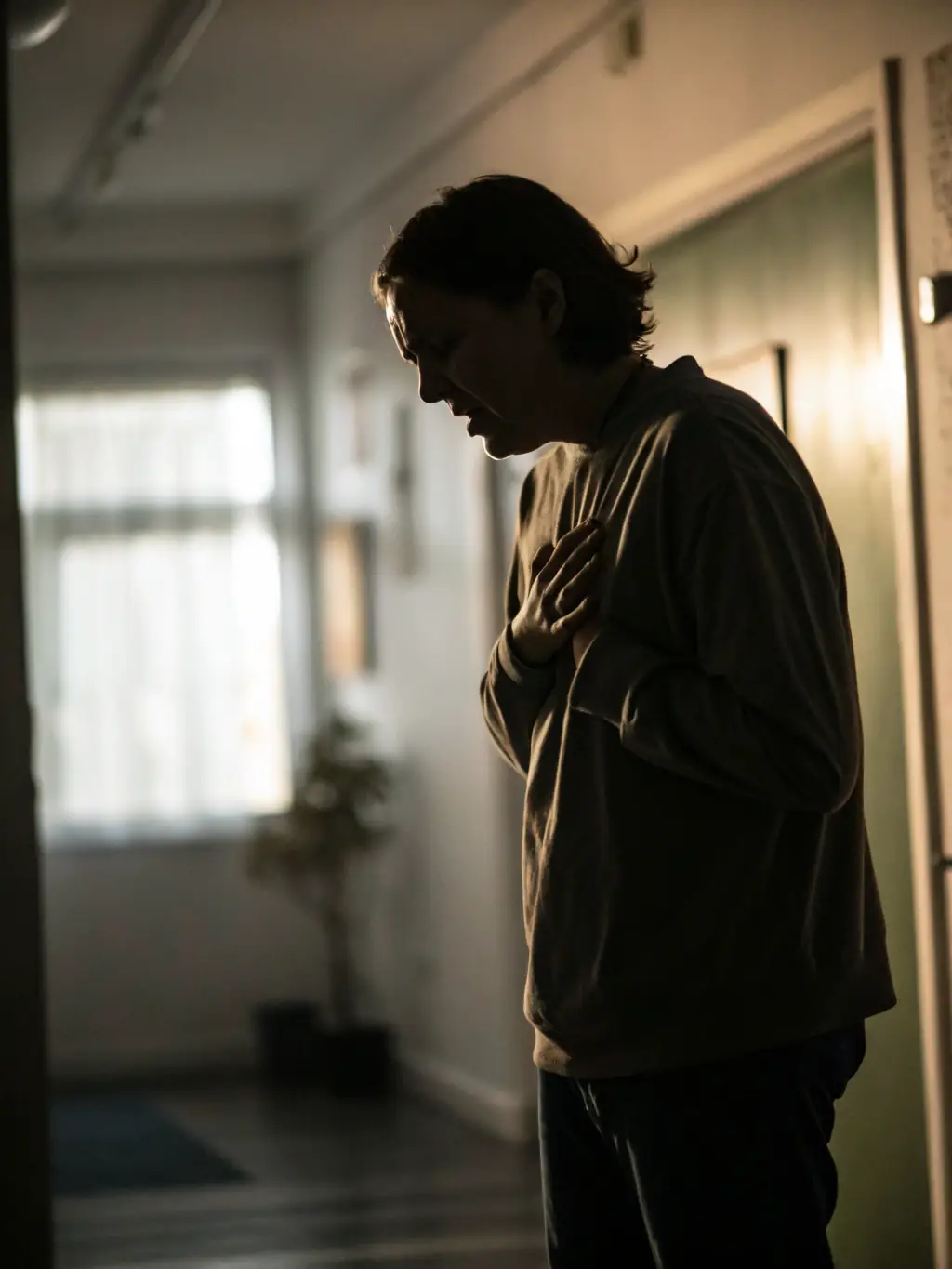 A person struggling to breathe while sleeping, depicting the challenges faced by individuals with sleep apnea.